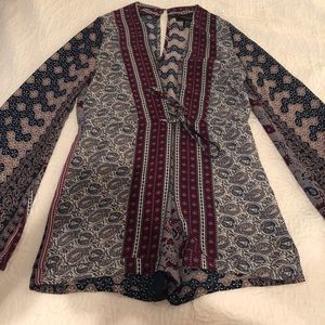 Groovy long-sleeve romper